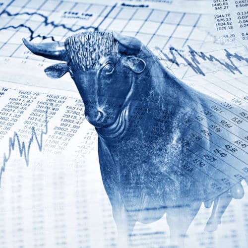 Financial symbols and bull stand for success in the stock market