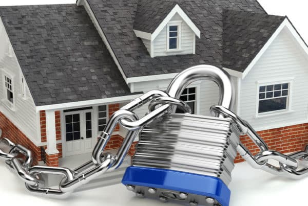illustration of house wrapped with padlock
