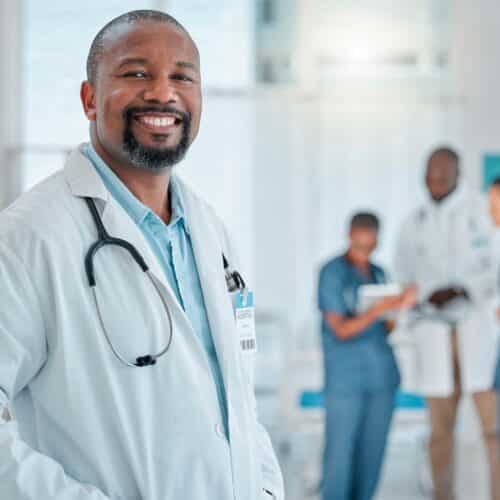 Physician reviewing employment benefits for doctors