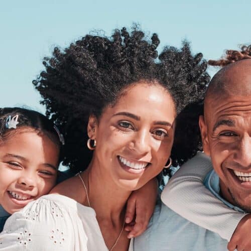 happy smiling family on the beach