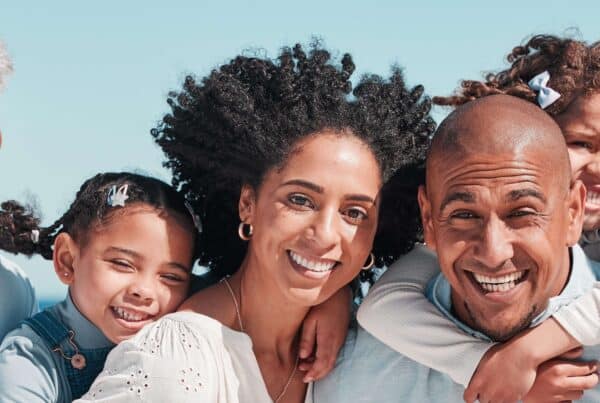 happy smiling family on the beach