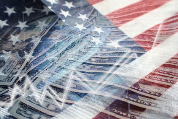 image showing the us flag with money overlayed