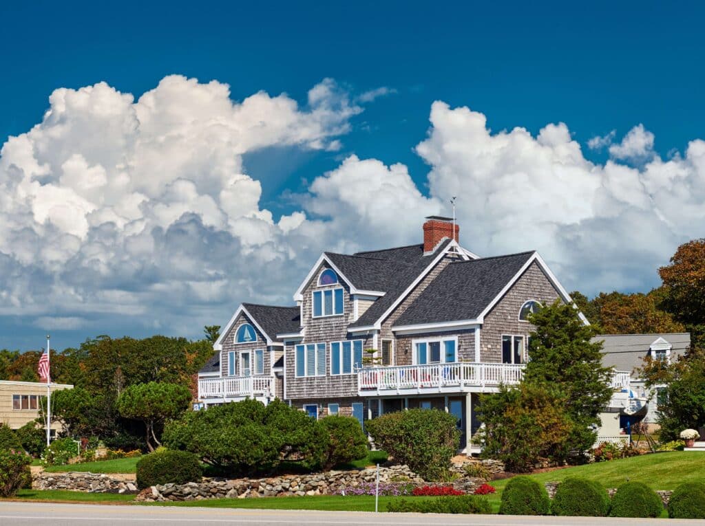 Picture of a large house in a suburban neighborhood